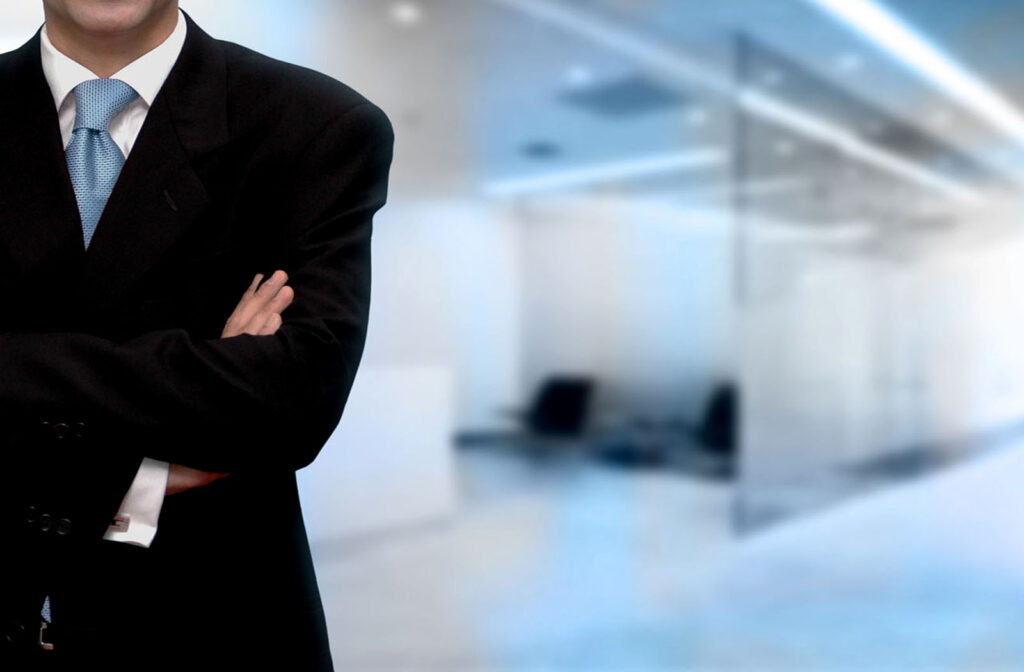 A person standing in formal